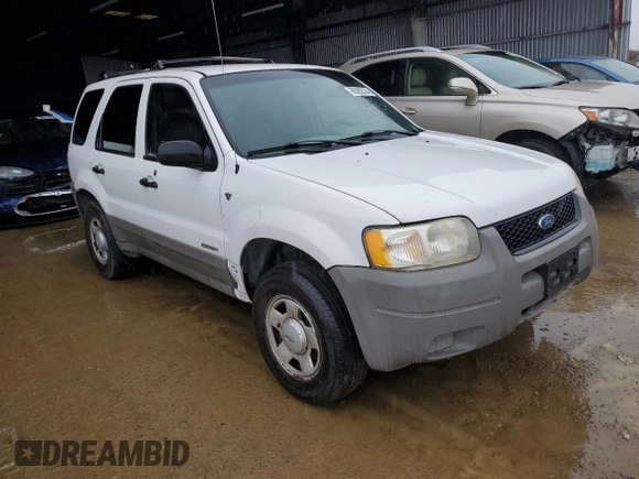 2001 Ford Escape XLS with VIN 1FMYU01191KA29996, listed as a Copart auction lot 86362534 with 265,271 mi miles and Salvage title. Bid and sale history available at DreamBid. Image 4.