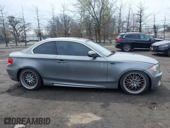 2011 BMW 1 Series 128i with VIN WBAUP9C52BVL89591, listed as a IAAI auction lot 41951870 with 131,377 mi miles and . Bid and sale history available at DreamBid. Image 13.