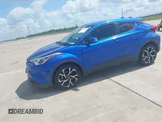 2018 Toyota C-HR XLE z VIN NMTKHMBX5JR057407, wystawiony jako IAAI lot #42363412 z przebiegiem 155 673 mil mil oraz . Historia ofert i sprzedaży dostępna na DreamBid. Obrazek 2.