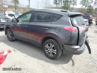 2016 Toyota RAV4 LE with VIN JTMZFREV2GJ092537, listed as a IAAI auction lot 41794148 with 145,678 mi miles. Bid and sale history available at carsss.com. Image 3.