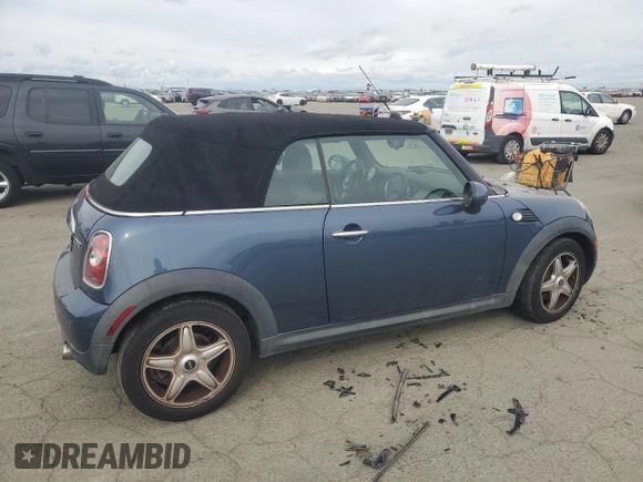 2010 MINI Convertible with VIN WMWMR3C52ATU98506, listed as a Copart auction lot 47706195 with 92,804 mi miles and Clean Title. Bid and sale history available at DreamBid. Image 3.