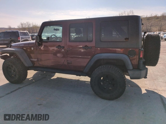 2010 Jeep Wrangler Unlimited Rubicon with VIN 1J4BA6H13AL140902, listed as a Copart auction lot 54335455 with 118,423 mi miles and Clean title. Bid and sale history available at DreamBid. Image 2.