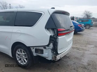 2023 Chrysler Pacifica Touring L with VIN 2C4RC1BG6PR520945, listed as a IAAI auction lot 41591128 with 70,351 mi miles and . Bid and sale history available at DreamBid. Image 18.