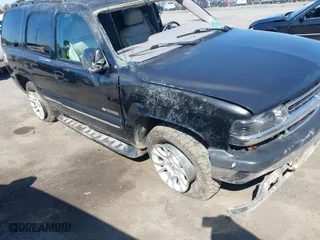 2000 Chevrolet New Tahoe LT with VIN 1GNEK13TXYJ191872, listed as a IAAI auction lot 41860033 with 1 mi miles. Bid and sale history available at carsss.com. Image 1.