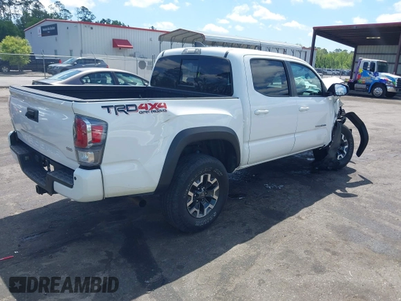 2020 Toyota Tacoma SR5 z VIN 5TFCZ5AN5LX231157, wystawiony jako IAAI lot #42045534 z przebiegiem 84 099 mil mil oraz . Historia ofert i sprzedaży dostępna na DreamBid. Obrazek 4.