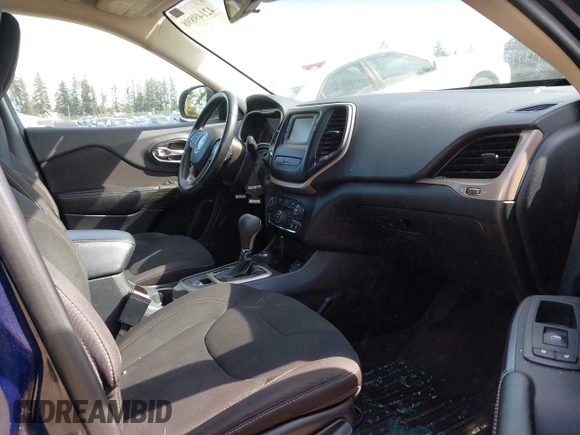 2015 Jeep Cherokee Latitude with VIN 1C4PJMCB0FW702535, listed as a IAAI auction lot 42149898 with 125,938 mi miles and . Bid and sale history available at carsss.com. Image 5.