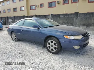 2000 Toyota Solara SE with VIN 2T1CF22P8YC357140, listed as a Copart auction lot 54100775 with 186,137 mi miles and Salvage Title. Bid and sale history available at DreamBid. Image 4.