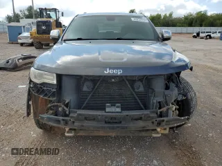 2015 Jeep Grand Cherokee Overland with VIN 1C4RJFCT4FC813510, listed as a Copart auction lot 41466395 with 135,124 mi miles and Salvage Title. Bid and sale history available at carsss.com. Image 5.