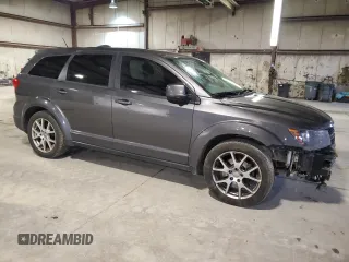 2014 Dodge Journey R/T with VIN 3C4PDCEG3ET309644, listed as a Copart auction lot 53986465 with 136,769 mi miles and Salvage title. Bid and sale history available at DreamBid. Image 4.