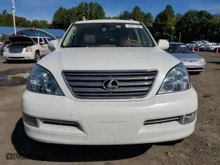 2004 Lexus GX 470 with VIN JTJBT20XX40033938, listed as a Copart auction lot 70871164 with 214,565 mi miles and Salvage Title. Bid and sale history available at carsss.com. Image 5.