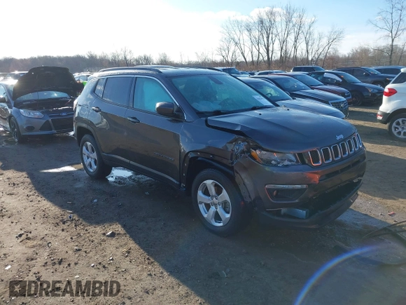 2020 Jeep Compass Latitude with VIN 3C4NJDBB3LT223939, listed as a IAAI auction lot 41832921 with 83,938 mi miles and . Bid and sale history available at DreamBid. Image 1.