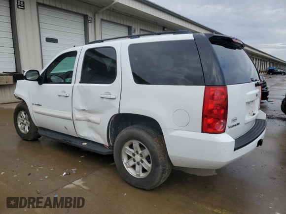 2009 GMC Yukon SLE w/3SA with VIN 1GKFC23C39R127163, listed as a Copart auction lot 85789904 with 186,725 mi miles and Salvage Title. Bid and sale history available at carsss.com. Image 2.