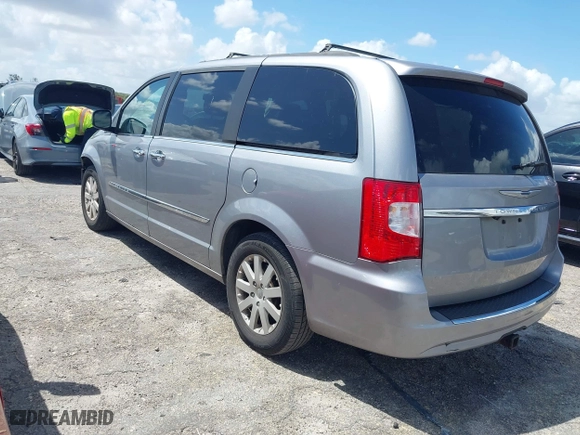 2014 Chrysler Town & Country Touring with VIN 2C4RC1BG6ER463885, listed as a IAAI auction lot 41943602 with 154,815 mi miles. Bid and sale history available at carsss.com. Image 3.