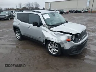 2017 Jeep Renegade Latitude z VIN ZACCJBBB7HPF23042, wystawiony jako IAAI lot #41843717 z przebiegiem 141 386 mil mil oraz . Historia ofert i sprzedaży dostępna na DreamBid. Obrazek 1.