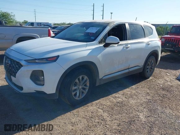 2019 Hyundai Santa Fe SE z VIN 5NMS23AD7KH058499, wystawiony jako IAAI lot #41963798 z przebiegiem Nie podano mil oraz . Historia ofert i sprzedaży dostępna na DreamBid. Obrazek 2.