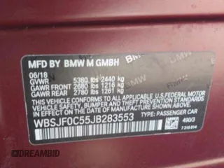 2018 BMW M5 z VIN WBSJF0C55JB283553, wystawiony jako Copart lot #55519235 z przebiegiem 57 128 mil mil oraz Szkody całkowita. Historia ofert i sprzedaży dostępna na DreamBid. Obrazek 10.