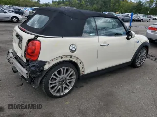 2017 MINI Convertible Cooper S с VIN WMWWG9C5XH3C80635, выставлен на аукционе Copart как лот 56167715 с пробегом 79 485 миль миль и Списание • Salvage title. История ставок и продаж доступна на DreamBid. Изображение 3.