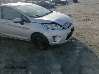 2013 Ford Fiesta S z VIN 3FADP4AJ9DM140665, wystawiony jako Copart lot #61634485 z przebiegiem 165 124 mil mil oraz Szkoda całkowita • Salvage title. Historia ofert i sprzedaży dostępna na DreamBid. Obrazek 13.