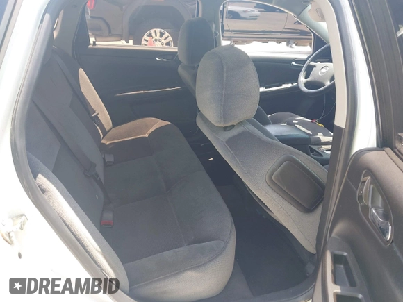 2014 Chevrolet Impala LS with VIN 2G1WA5E30E1161444, listed as a IAAI auction lot 42365750 with 184,112 mi miles and . Bid and sale history available at DreamBid. Image 8.