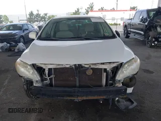2011 Toyota Corolla L with VIN JTDBU4EE9B9131113, listed as a IAAI auction lot 42028423 with 191,157 mi miles. Bid and sale history available at carsss.com. Image 13.