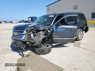 2019 Chevrolet Tahoe LT with VIN 1GNSCBKC0KR273948, listed as a Copart auction lot 61309785 with 155,428 mi miles and Salvage title. Bid and sale history available at DreamBid. Image 1.