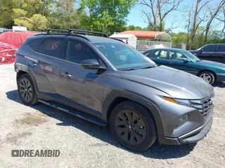 2024 Hyundai Tucson XRT z VIN KM8JF3DE5RU320331, wystawiony jako IAAI lot #42043282 z przebiegiem 14 358 mil mil oraz . Historia ofert i sprzedaży dostępna na DreamBid. Obrazek 1.