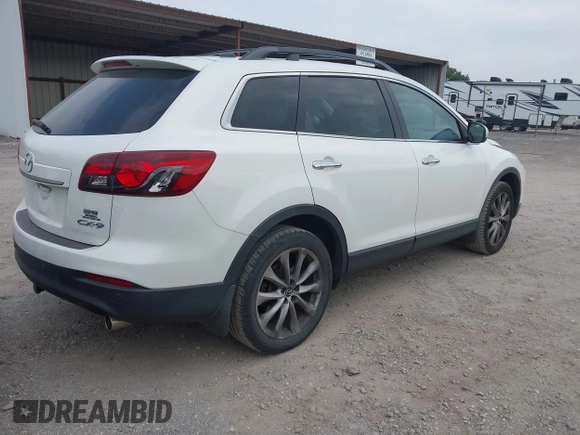 2015 Mazda CX-9 Grand Touring with VIN JM3TB2DA7F0448886, listed as a IAAI auction lot 42440203 with 108,765 mi miles and . Bid and sale history available at DreamBid. Image 4.