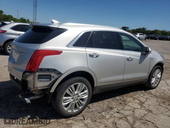 2019 Cadillac XT5 Premium Luxury AWD with VIN 1GYKNFRS6KZ233259, listed as a Copart auction lot 53647695 with 128,534 mi miles and Salvage title. Bid and sale history available at DreamBid. Image 3.