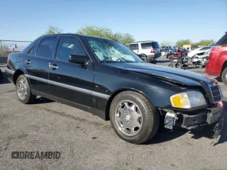 1994 Mercedes-Benz C z VIN WDBHA28E3RF075327, wystawiony jako Copart lot #57819825 z przebiegiem 83 224 mil mil oraz Szkoda całkowita • Salvage title. Historia ofert i sprzedaży dostępna na DreamBid. Obrazek 4.