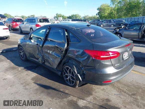 2018 Ford Focus SE with VIN 1FADP3FE0JL270966, listed as a IAAI auction lot 42206548 with 89,067 mi miles and . Bid and sale history available at DreamBid. Image 3.