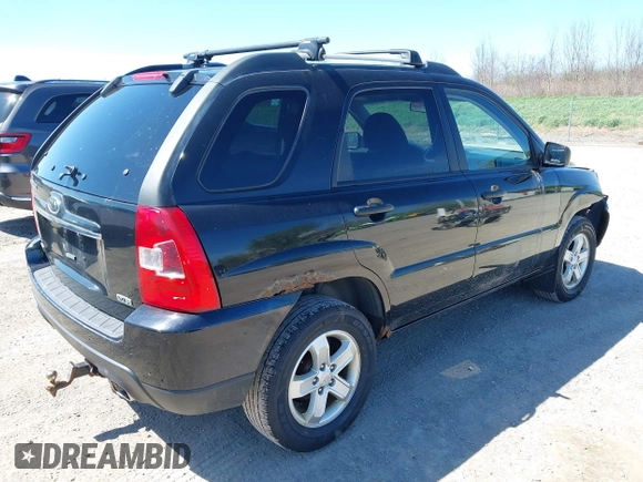 2010 Kia Sportage LX with VIN KNDKGCA34A7669279, listed as a IAAI auction lot 42132770 with 142,828 mi miles and . Bid and sale history available at carsss.com. Image 4.