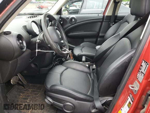 2015 MINI Countryman S with VIN WMWZC5C54FWP42858, listed as a Copart auction lot 60684185 with 83,163 mi miles and Salvage title. Bid and sale history available at DreamBid. Image 7.