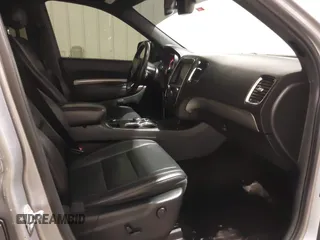 2014 Dodge Durango R/T with VIN 1C4SDJCTXEC558937, listed as a IAAI auction lot 41570244 with 174,724 mi miles and . Bid and sale history available at DreamBid. Image 5.