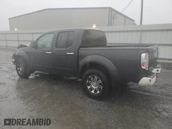 2010 Nissan Frontier SE with VIN 1N6AD0EV5AC407533, listed as a Copart auction lot 52020365 with 119,041 mi miles and Salvage title. Bid and sale history available at DreamBid. Image 2.