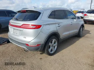 2015 Lincoln MKC z VIN 5LMCJ1A91FUJ13477, wystawiony jako IAAI lot #42042457 z przebiegiem 134 046 mil mil oraz . Historia ofert i sprzedaży dostępna na DreamBid. Obrazek 4.
