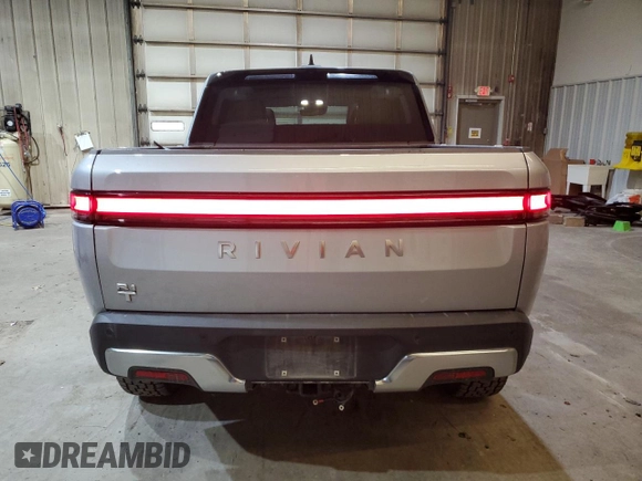 2024 Rivian R1T Adventure z VIN 7FCTGCAA0RN030370, wystawiony jako Copart lot #87251784 z przebiegiem 11 549 mil mil oraz Szkody całkowita. Historia ofert i sprzedaży dostępna na DreamBid. Obrazek 6.