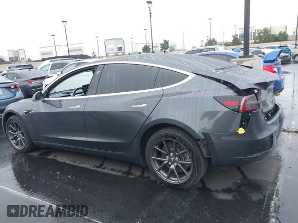 2018 Tesla Model 3 Long Range Battery with VIN 5YJ3E1EB1JF149423, listed as a IAAI auction lot 41896090 with 158,787 mi miles and . Bid and sale history available at DreamBid. Image 15.