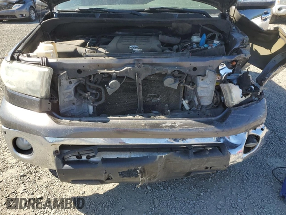 2012 Toyota Tundra 4WD Truck LTD with VIN 5TFHY5F15CX256557, listed as a Copart auction lot 58452704 with 128,640 mi miles and Salvage Title. Bid and sale history available at carsss.com. Image 12.