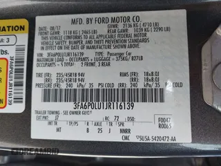 2018 Ford Fusion Hybrid SE with VIN 3FA6P0LU1JR116139, listed as a IAAI auction lot 41933594 with 83,000 mi miles. Bid and sale history available at carsss.com. Image 9.