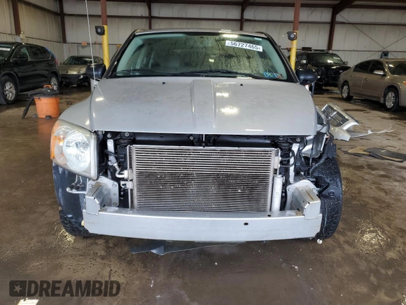 2011 Dodge Caliber Mainstreet z VIN 1B3CB3HAXBD237629, wystawiony jako Copart lot #56727465 z przebiegiem 155 166 mil mil oraz Szkoda całkowita • Salvage title. Historia ofert i sprzedaży dostępna na DreamBid. Obrazek 5.