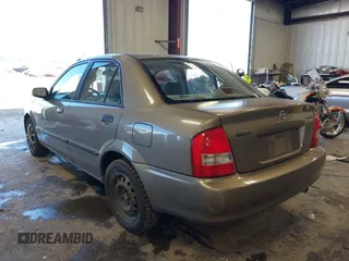 2000 Mazda Protege DX with VIN JM1BJ2225Y0278677, listed as a IAAI auction lot 42056816 with 188,552 mi miles and . Bid and sale history available at DreamBid. Image 3.