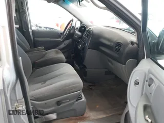 2005 Dodge Caravan SXT with VIN 2D4GP44L65R335656, listed as a IAAI auction lot 42526728 with 322,176 mi miles and . Bid and sale history available at DreamBid. Image 5.