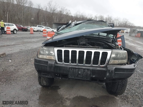 2002 Jeep Grand Cherokee Laredo with VIN 1J4GW48S82C321712, listed as a IAAI auction lot 41855809 with 1 mi miles. Bid and sale history available at carsss.com. Image 12.