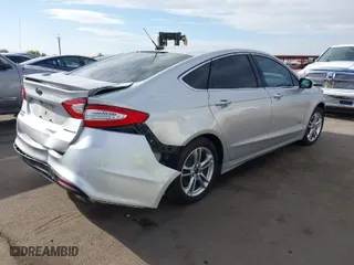2016 Ford Fusion Energi Titanium with VIN 3FA6P0SU6GR144898, listed as a IAAI auction lot 41912557 with 173,415 mi miles. Bid and sale history available at carsss.com. Image 4.