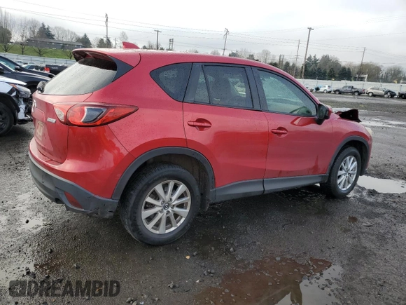 2014 Mazda CX-5 Touring с VIN JM3KE2CY3E0308740, выставлен на аукционе Copart как лот 88127365 с пробегом 137 690 миль миль и Списание • Salvage title. История ставок и продаж доступна на DreamBid. Изображение 3.