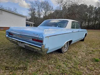 1964 Oldsmobile 88 z VIN 854M274413, wystawiony jako Copart lot #48237445 z przebiegiem 45 480 mil mil oraz Tytuł czysty. Historia ofert i sprzedaży dostępna na DreamBid. Obrazek 4.