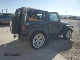 2015 Jeep Wrangler Sahara with VIN 1C4AJWBG5FL733795, listed as a Copart auction lot 61998255 with 86,655 mi miles and Salvage title. Bid and sale history available at DreamBid. Image 3.
