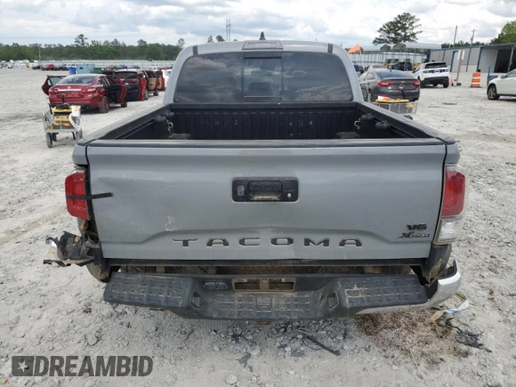 2021 Toyota Tacoma SR with VIN 3TMCZ5AN2MM397322, listed as a Copart auction lot 55470385 with 66,224 mi miles and Salvage title. Bid and sale history available at DreamBid. Image 6.