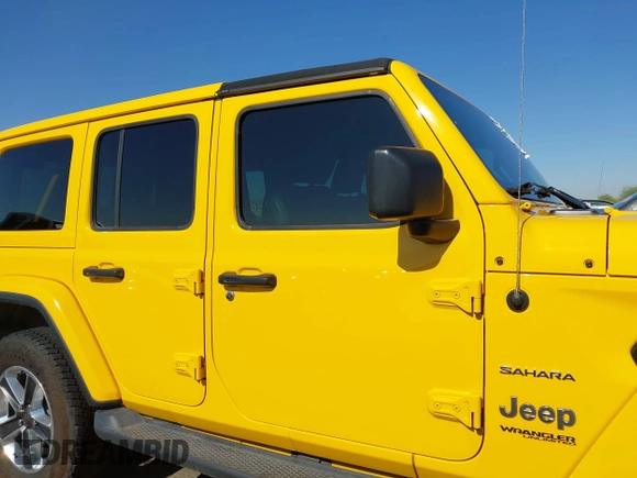 2018 Jeep Wrangler Unlimited Sahara z VIN 1C4HJXEN3JW306282, wystawiony jako IAAI lot #42302821 z przebiegiem 70 204 mil mil oraz . Historia ofert i sprzedaży dostępna na DreamBid. Obrazek 14.