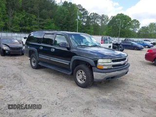 2003 Chevrolet Suburban LT z VIN 3GNGK26G93G102137, wystawiony jako IAAI lot #42087381 z przebiegiem 247 382 mil mil oraz . Historia ofert i sprzedaży dostępna na DreamBid. Obrazek 1.